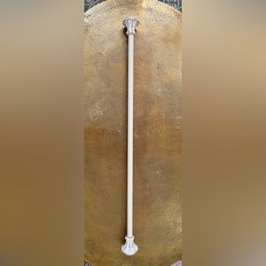 Extension curtain rod with hardware.